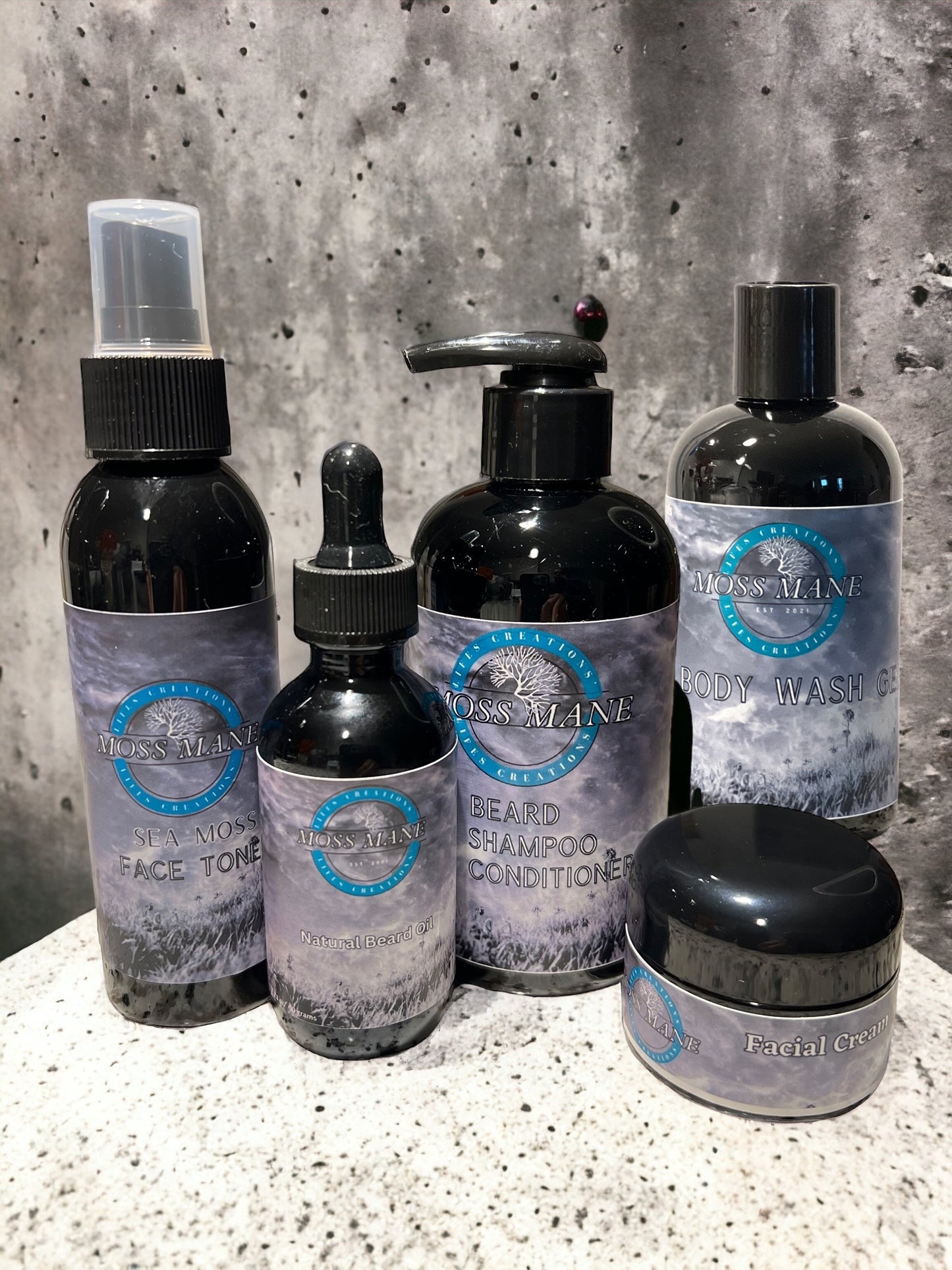 Sea Moss Me men's beard oil, body wash, face toner, beard shampoo and conditioner, facial cream.