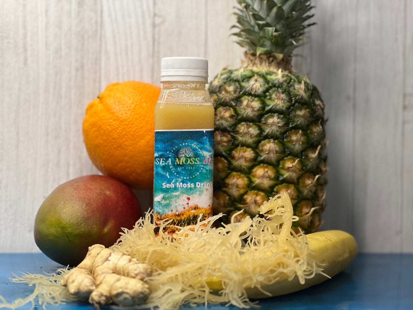 C Boost Juice - Sea Moss Me Shop - Juice surrounded by fruits and sea moss